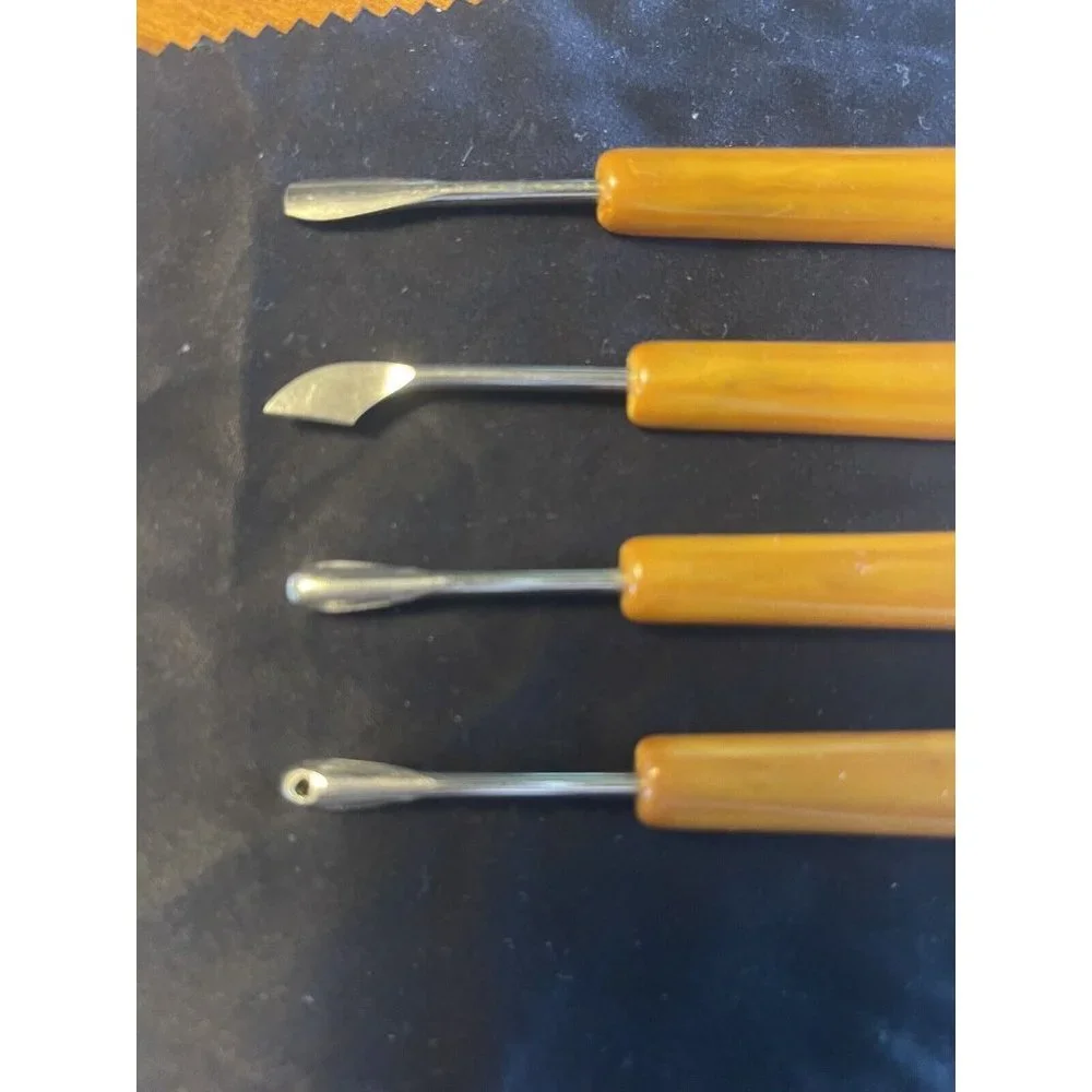 Egg Yolk Bakelite Four Piece Manicure Set